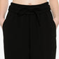 Honey in Black trousers