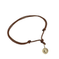 "Madone" pendant bracelet in 9K gold with brown leather strap