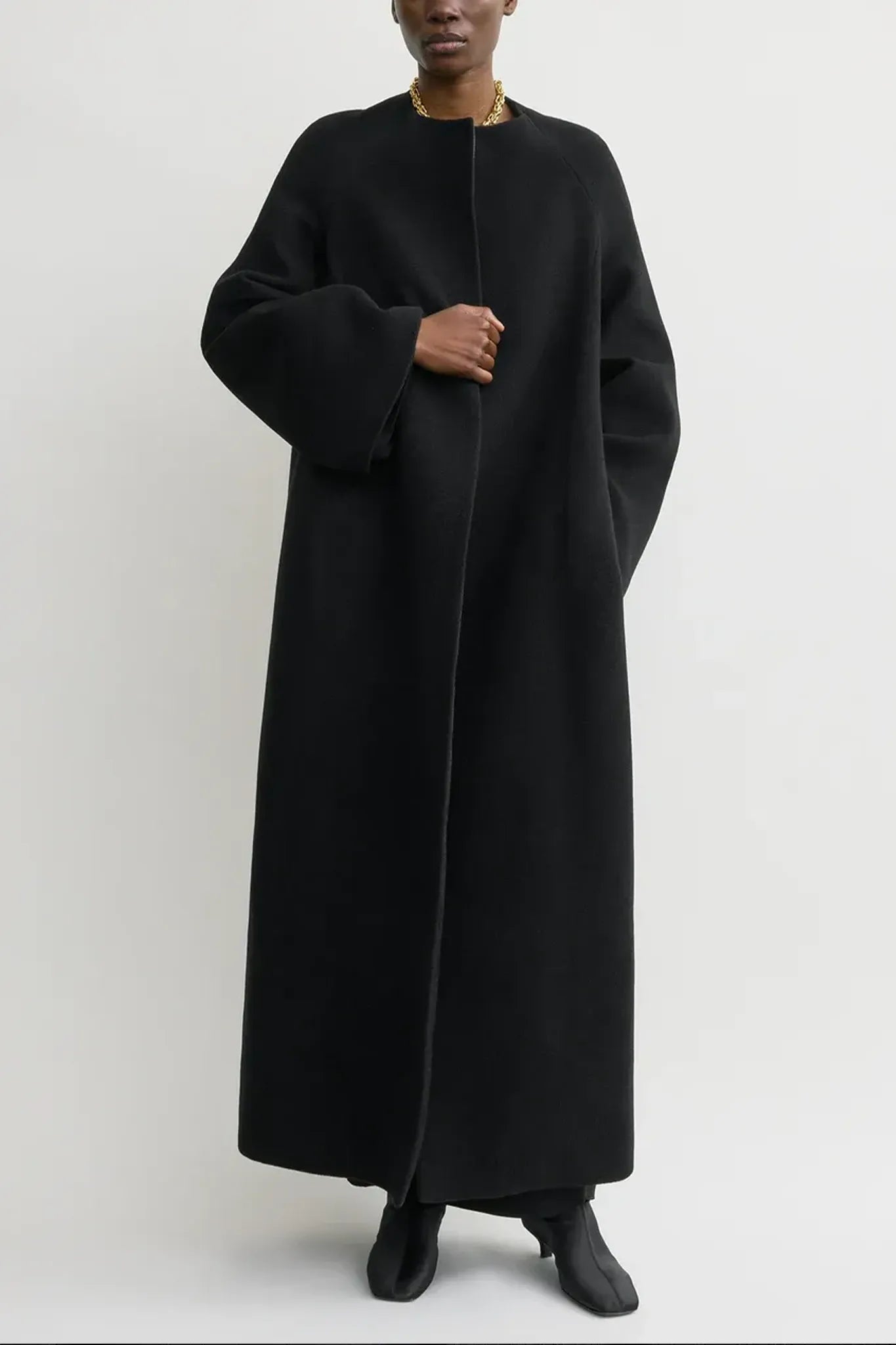 Bell-sleeve coat in black