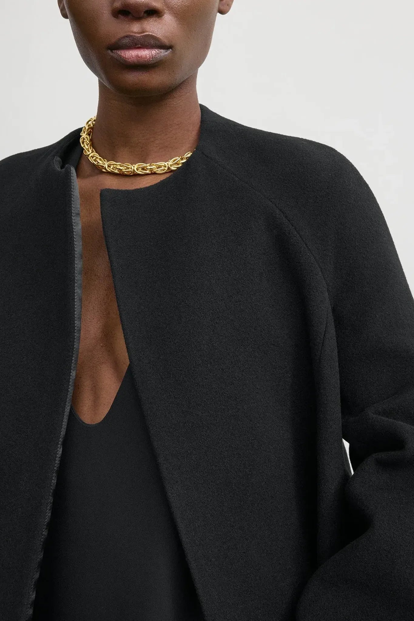 Bell-sleeve coat in black