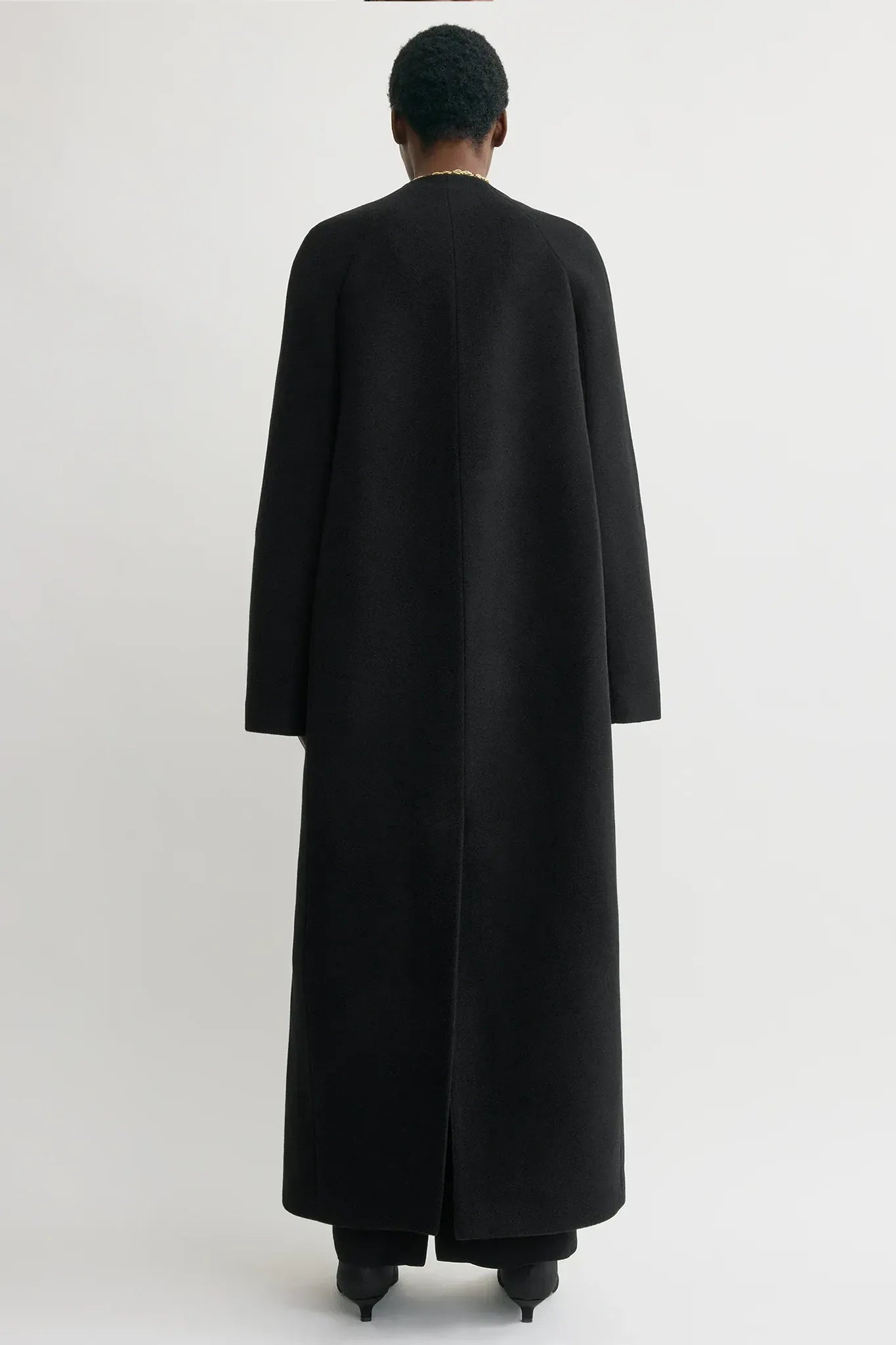 Bell-sleeve coat in black