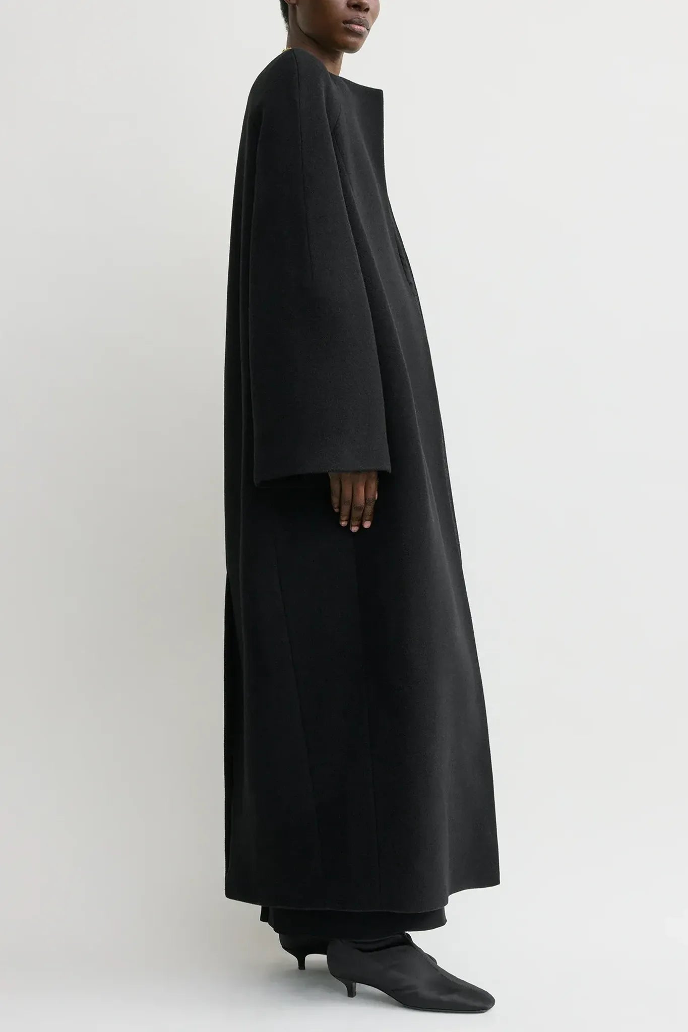 Bell-sleeve coat in black