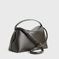Tasche T-Lock Leather Top Handle in Bark