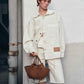 Tasche Mochi Suede in Cognac