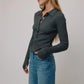 Strickpolo Abigail in Grau